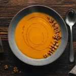 Huile de noix perigord noir : filet ambré sur potimarron et cerneaux